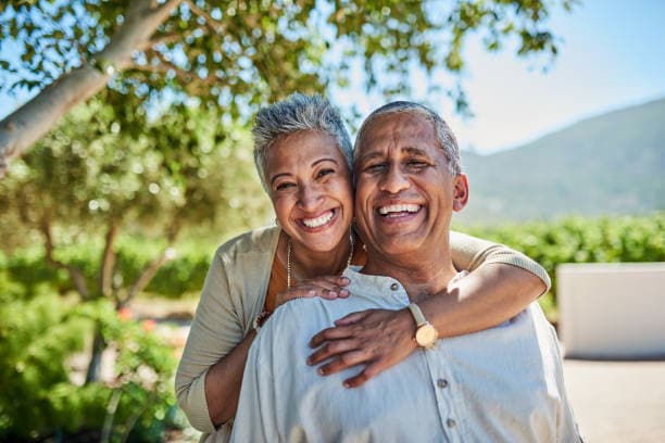Happy senior couple enjoying retirement with a reverse mortgage